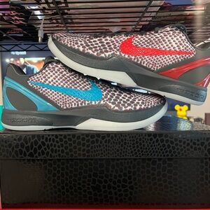 Nike Zoom Sneakers with Red and Blue Highlights